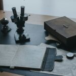 black and gray metal tool on black wooden table